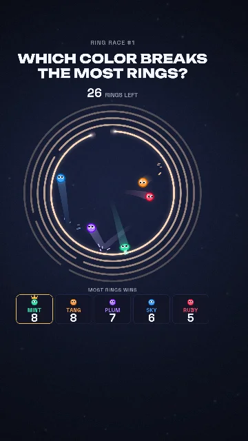Watch Ring Race episode 1: Which color breaks the most rings? Colored balls inside a stack of rings above a scoreboard of rings broken.